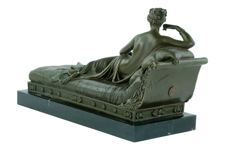 Bronze statue of Pauline Bonaparte reclining on a chaise longue, inspired by Canova's Venus Triumphant.