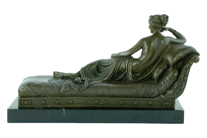 Bronze statue of Pauline Bonaparte reclining on a chaise longue, inspired by Antonio Canova's Venus Triumphant.