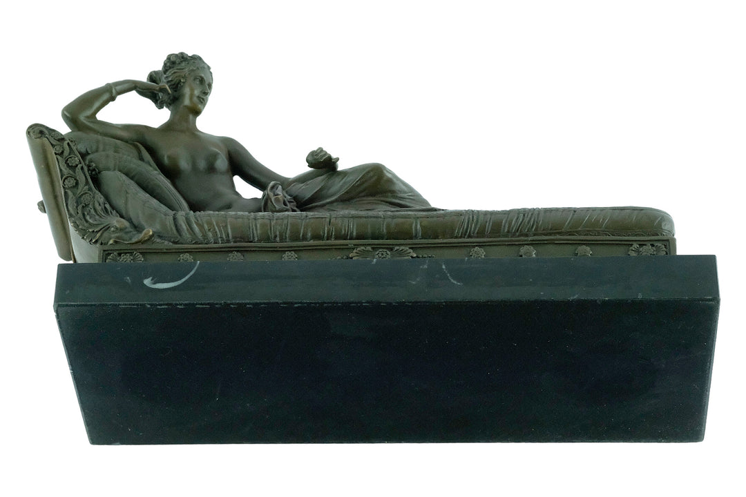 Bronze figure of Pauline Bonaparte reclining on a chaise longue, replicating Venus Triumphant, mounted on marble.