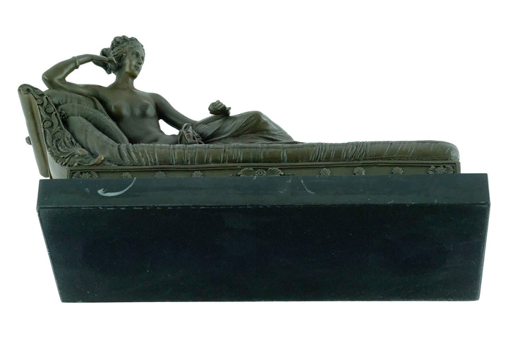 Bronze figure of Pauline Bonaparte reclining on a chaise longue, replicating Venus Triumphant, mounted on marble.