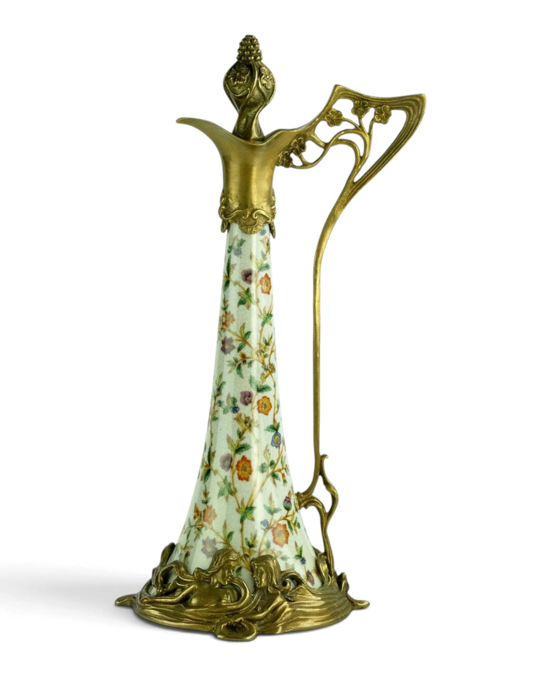 Bronze mounted porcelain claret jug with flower decoration