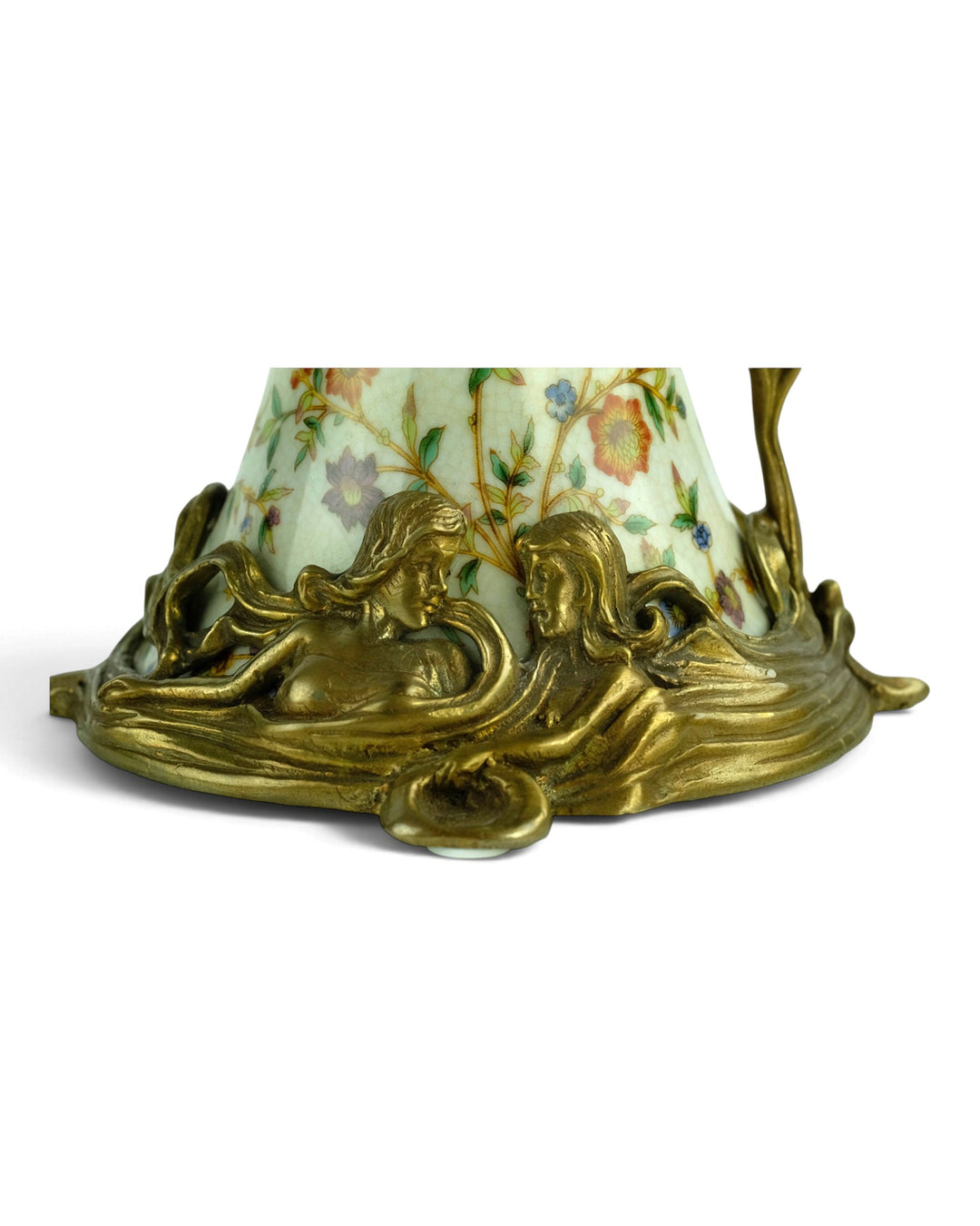 Bronze mounted porcelain claret jug with flower decoration