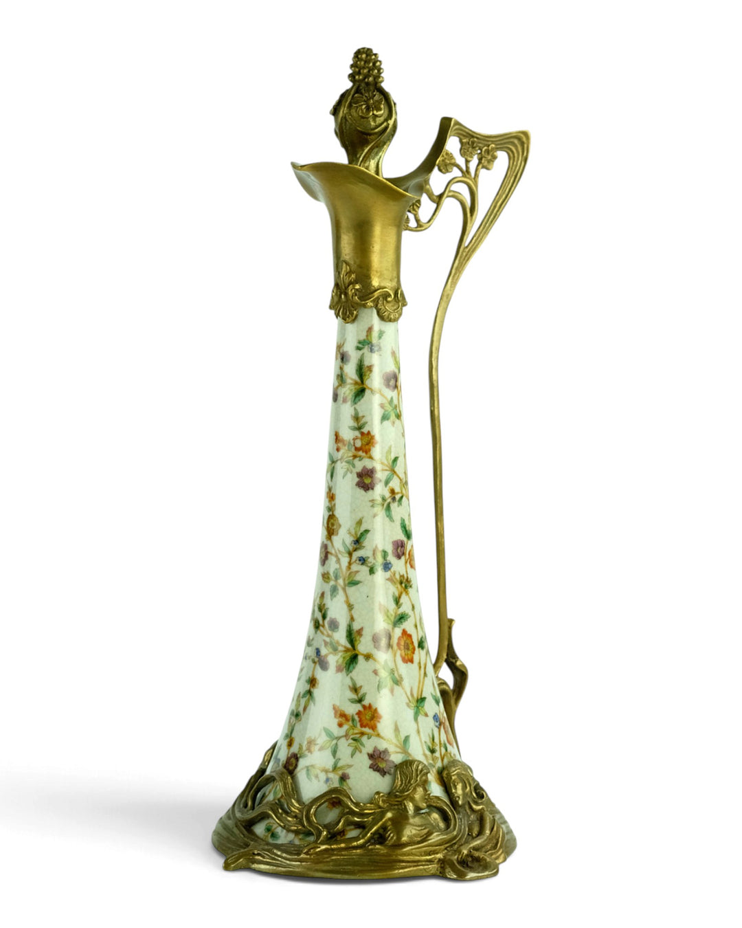 Bronze mounted porcelain claret jug with flower decoration