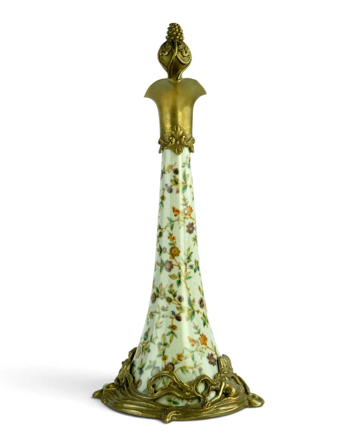 Bronze mounted porcelain claret jug with flower decoration