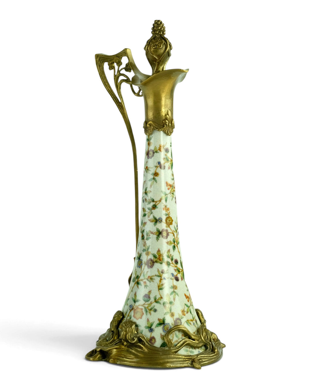 Bronze mounted porcelain claret jug with flower decoration