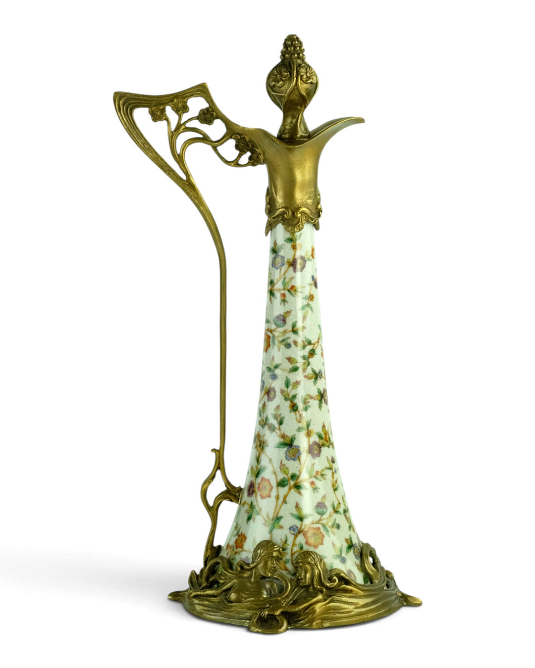 Bronze mounted porcelain claret jug with flower decoration