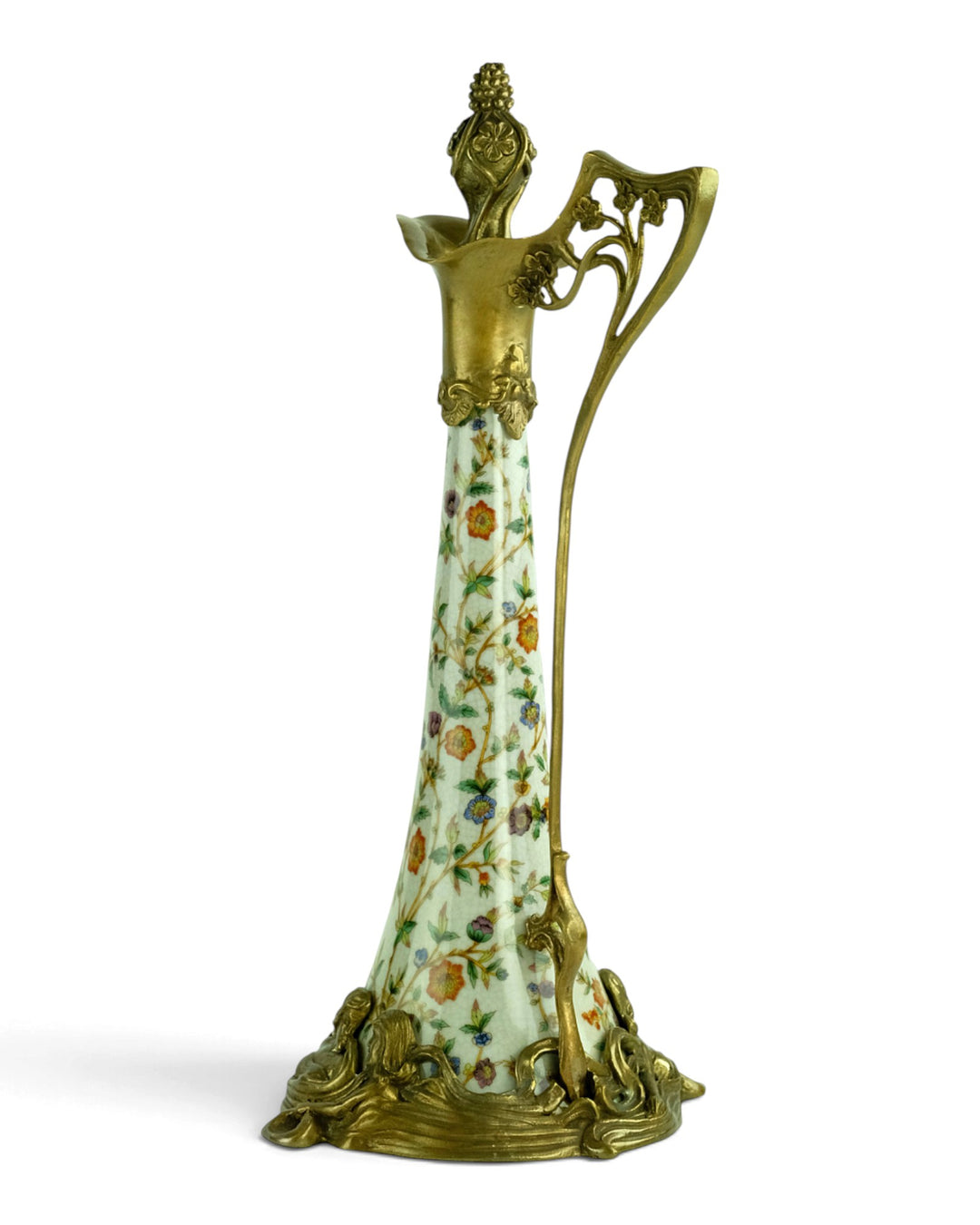 Bronze mounted porcelain claret jug with flower decoration