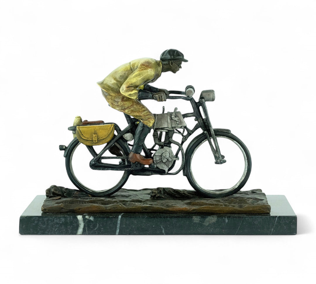 Bronze sculpture of an early moped rider