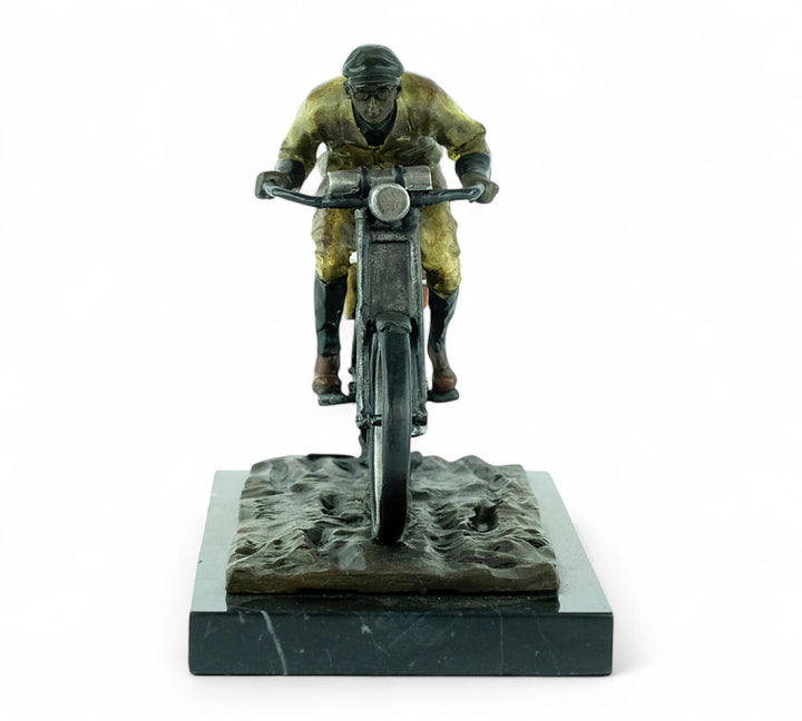 Bronze sculpture of an early moped rider