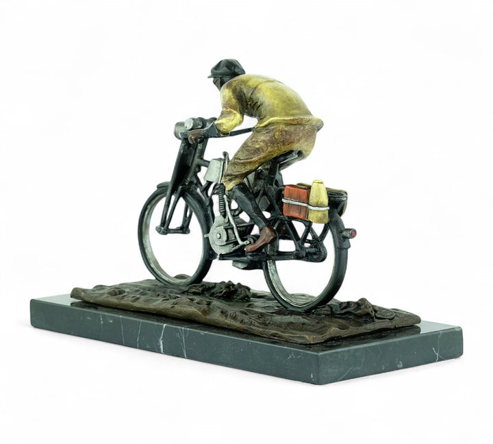 Bronze sculpture of an early moped rider