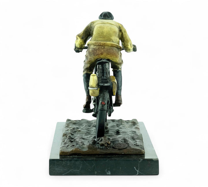 Bronze sculpture of an early moped rider