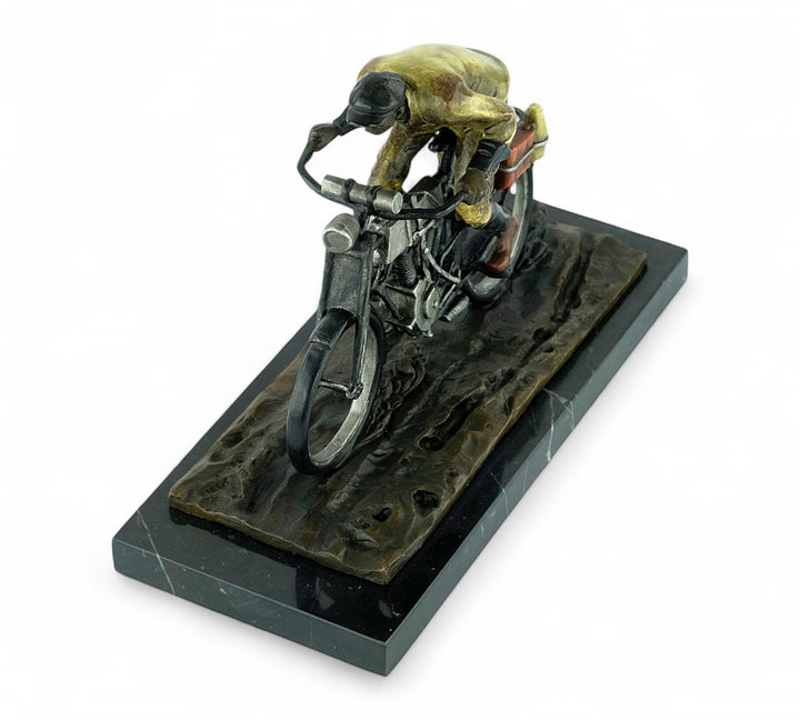 Bronze sculpture of an early moped rider