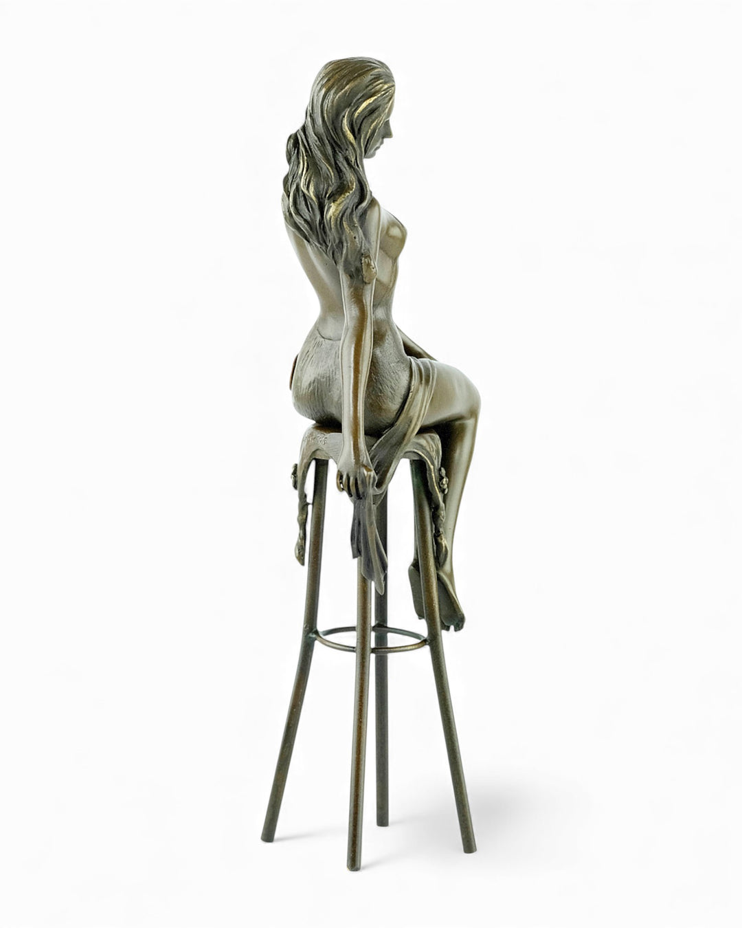 Bronze sculpture of a female on a barstool wearing a sensual dress