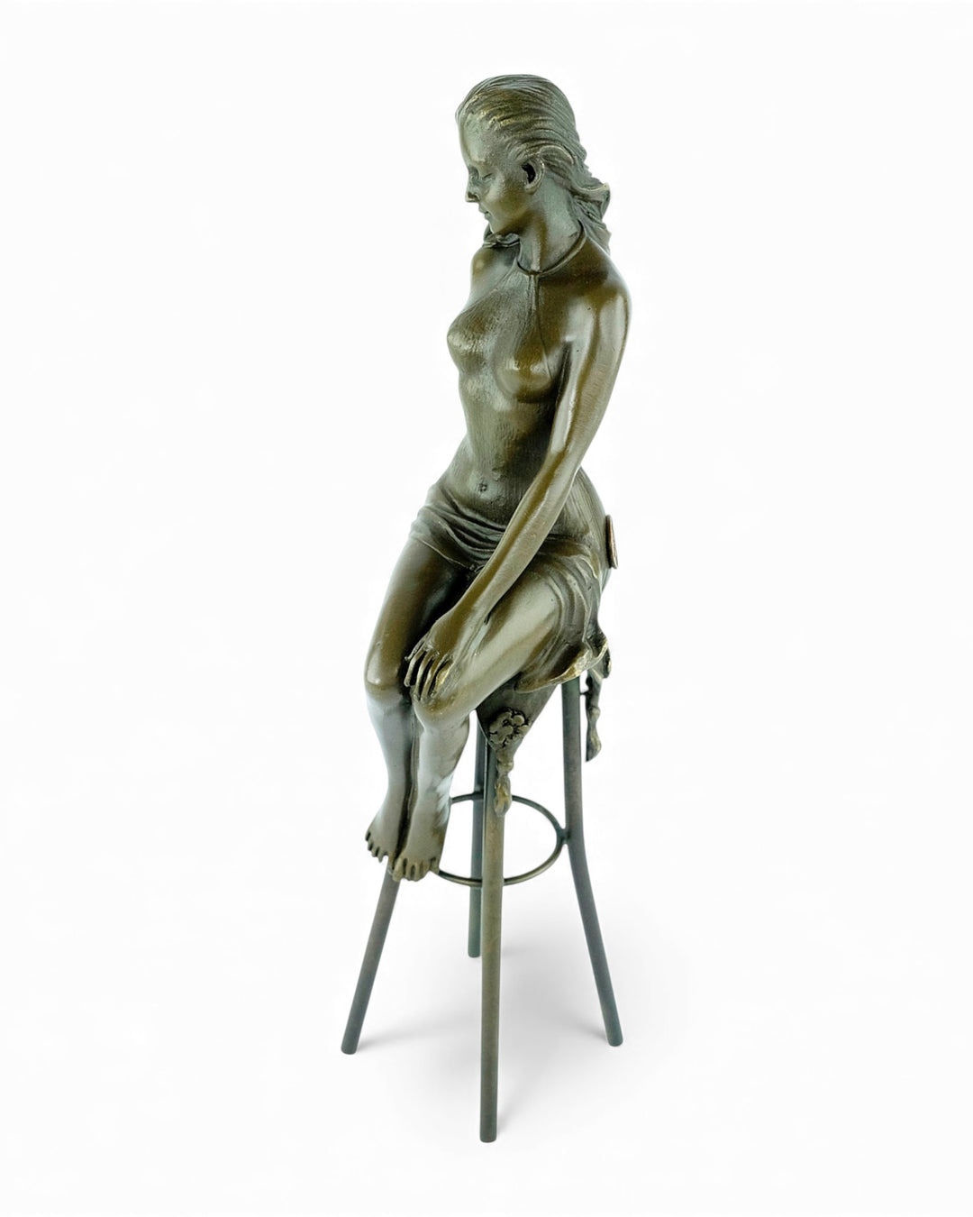 Bronze sculpture of a female on a barstool wearing a sensual dress