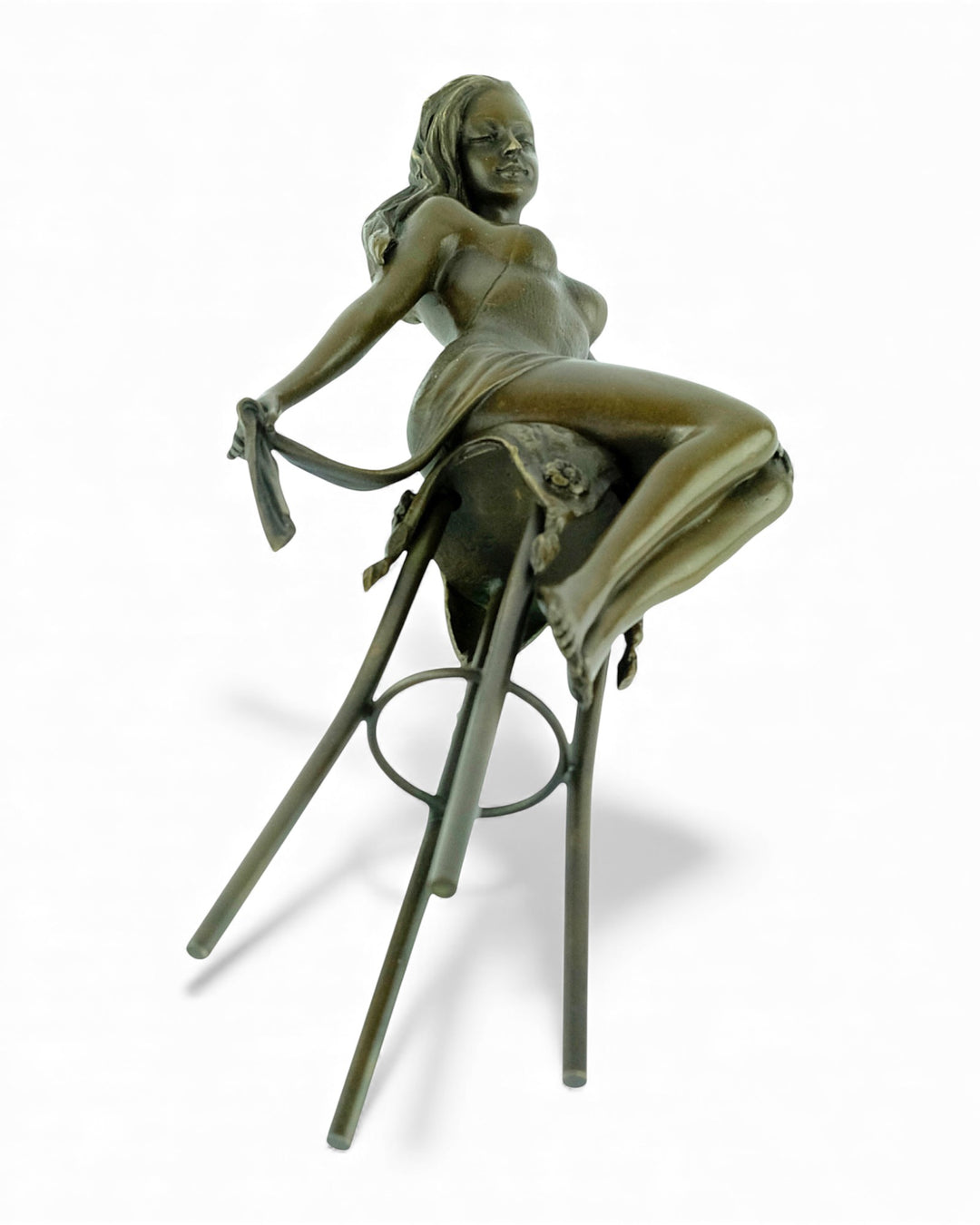 Bronze sculpture of a female on a barstool wearing a sensual dress