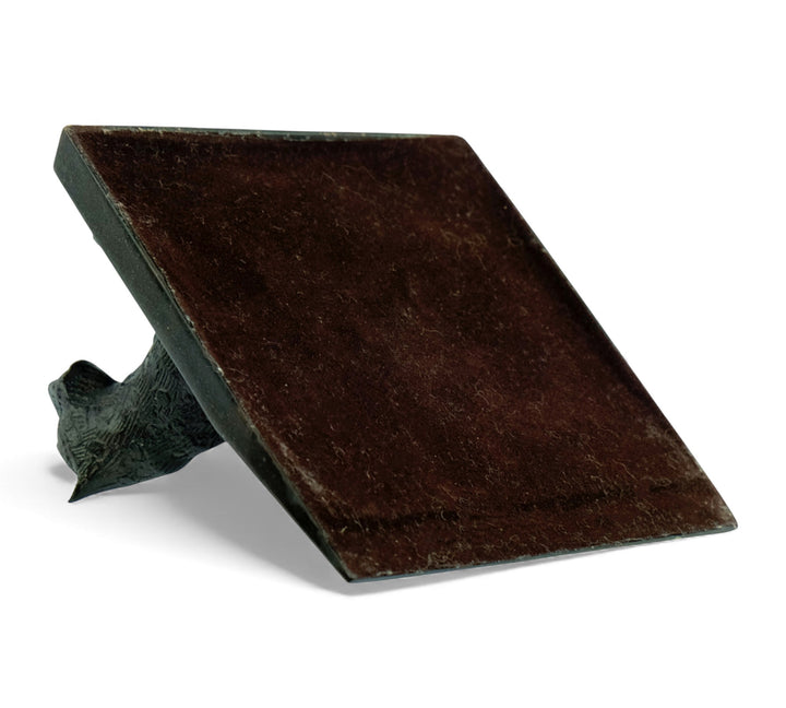 Vintage bronzen deurstopper met een liggende luipaard
