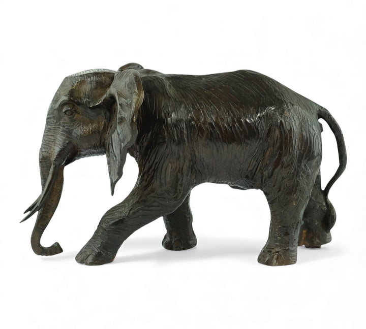 Vintage bronze sculpture of a walking African elephant