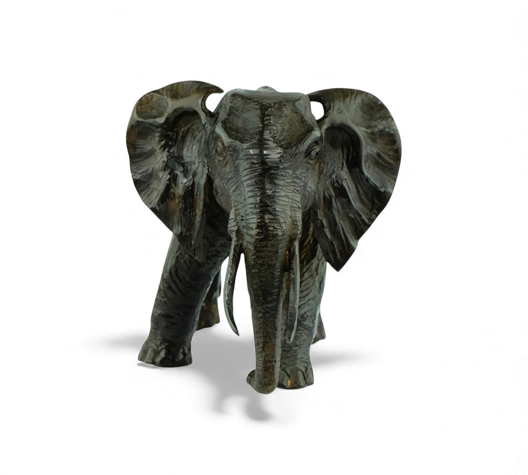 Vintage bronze sculpture of a walking African elephant