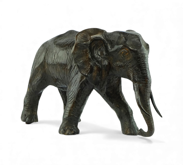 Vintage bronze sculpture of a walking African elephant