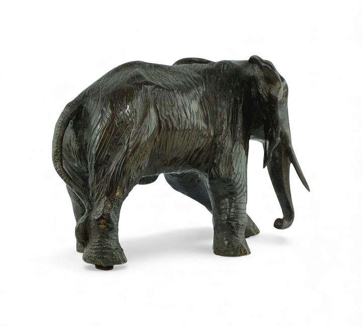 Vintage bronze sculpture of a walking African elephant