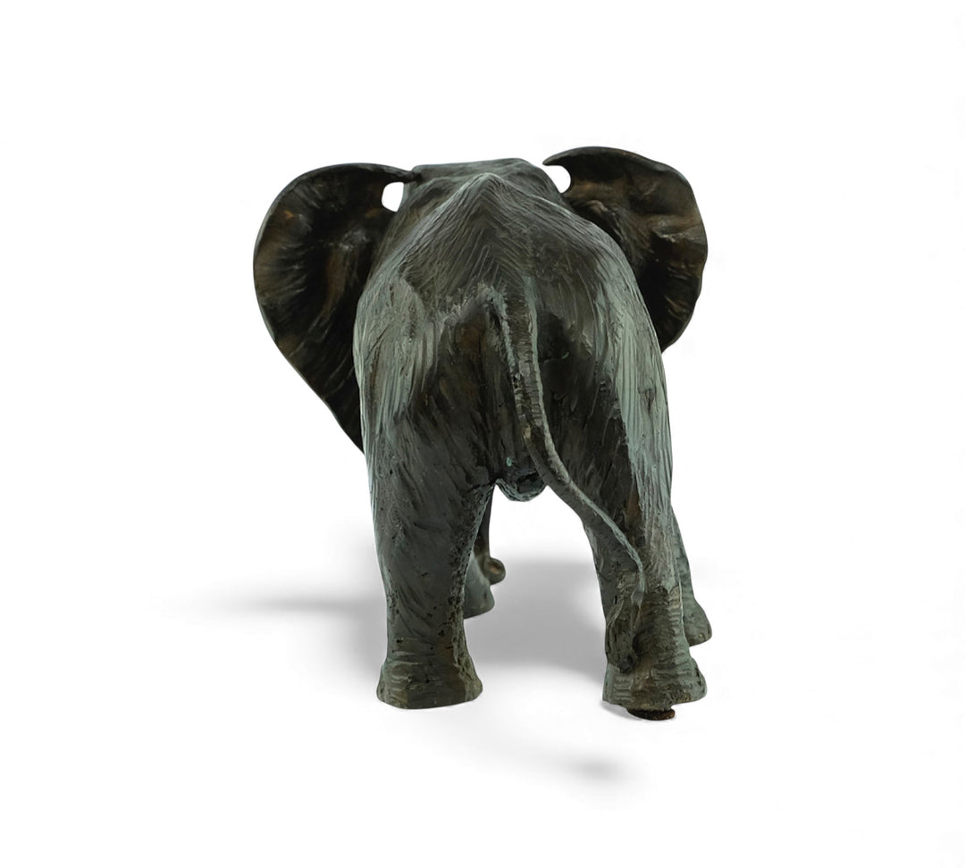 Vintage bronze sculpture of a walking African elephant