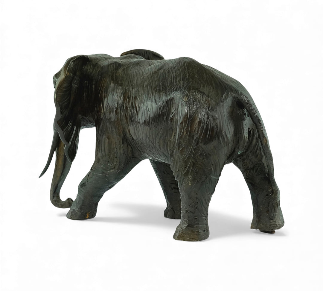 Vintage bronze sculpture of a walking African elephant