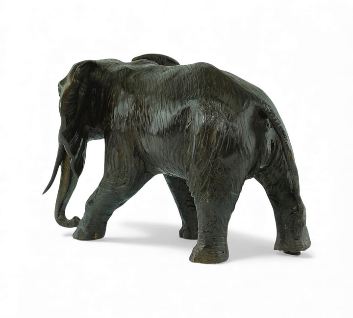 Vintage bronze sculpture of a walking African elephant