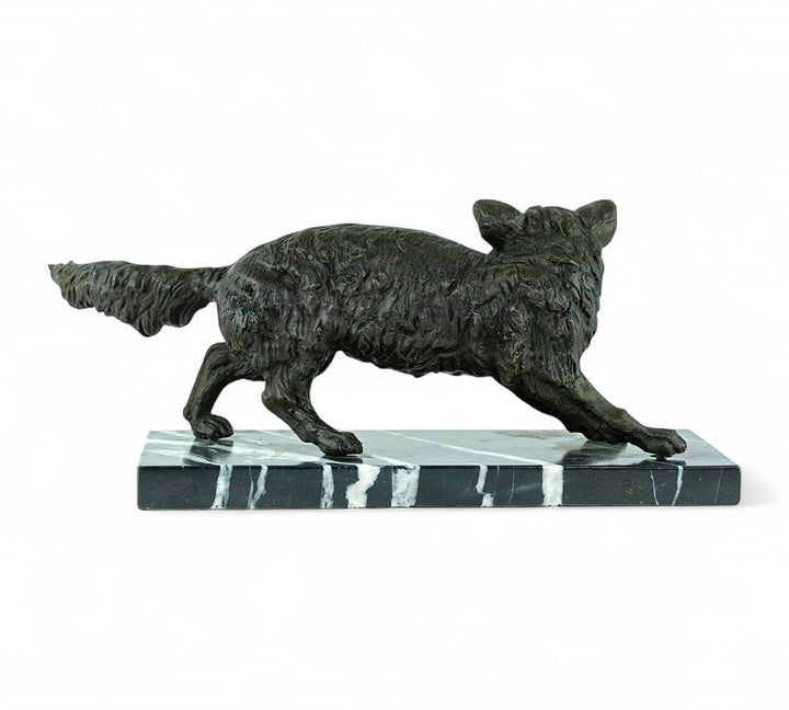Bronze sculpture of a wiley fox