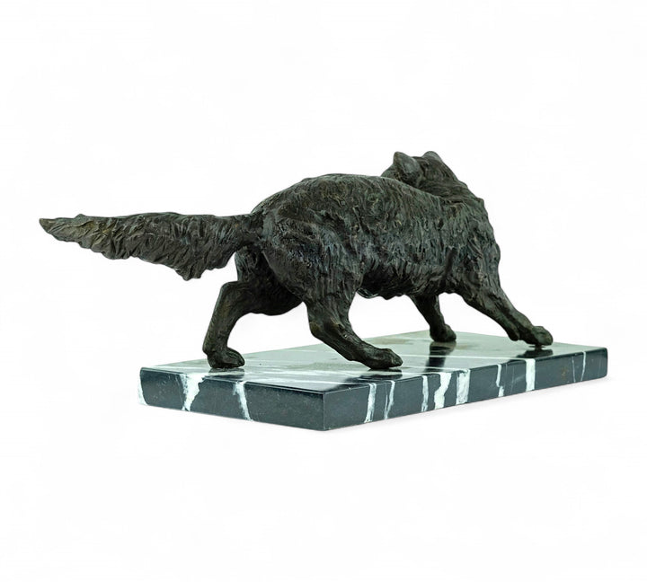 Bronze sculpture of a wiley fox