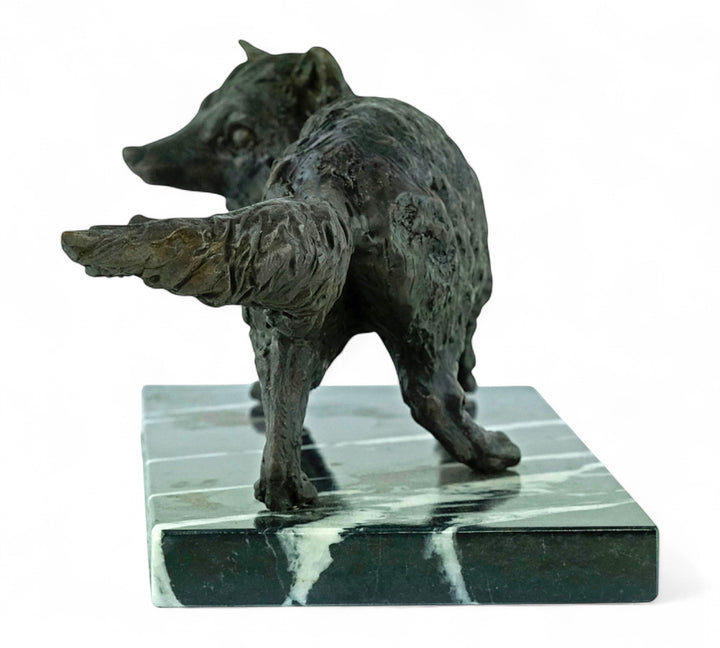 Bronze sculpture of a wiley fox