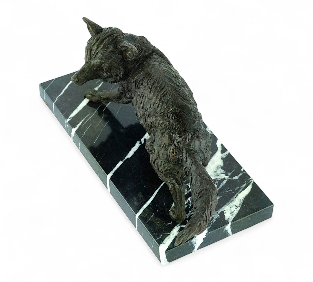 Bronze sculpture of a wiley fox