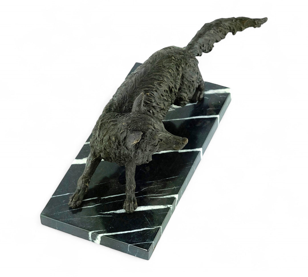 Bronze sculpture of a wiley fox