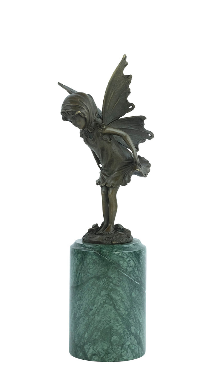 Bronze sculpture of a little winged fairy standing