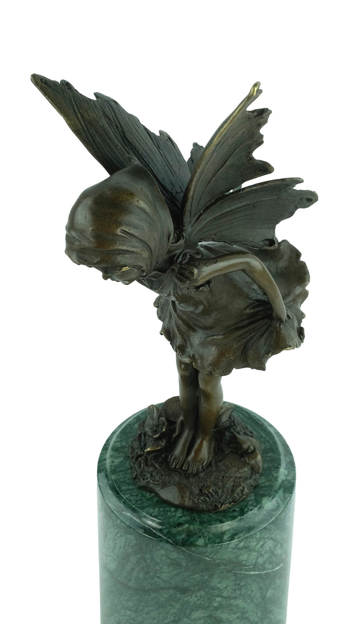 Bronze sculpture of a little winged fairy standing