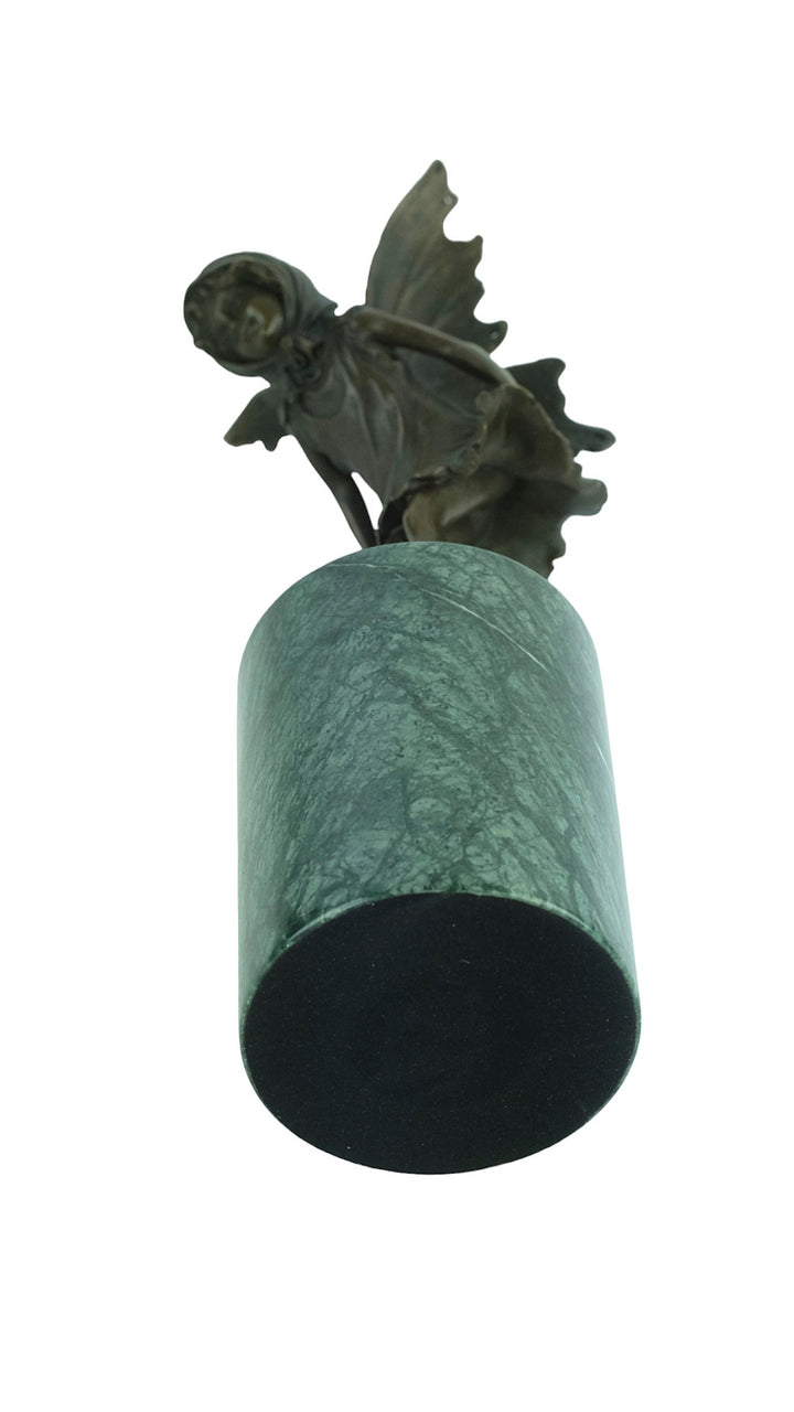 Bronze sculpture of a little winged fairy standing