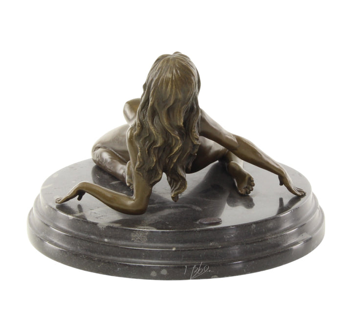 Bronze sculpture of a female nude leaning backwards