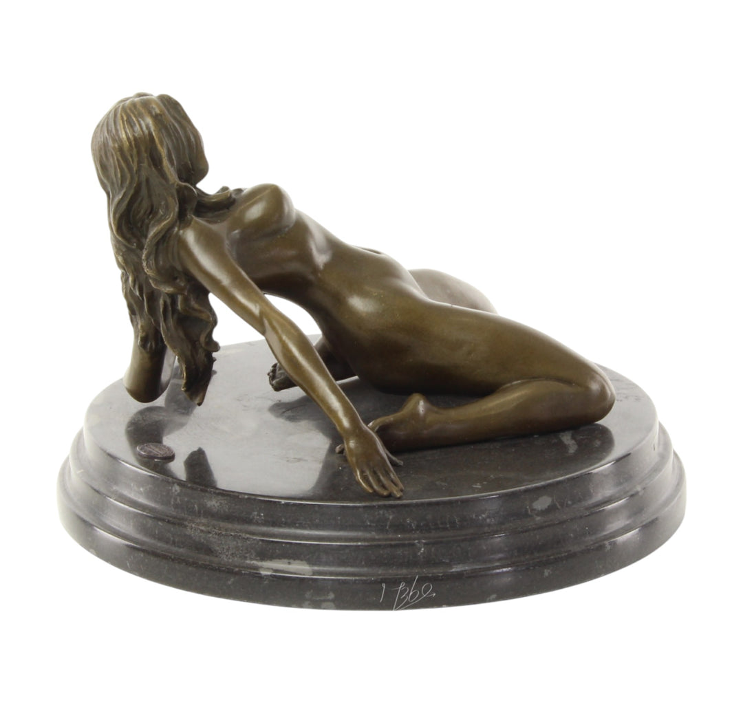 Bronze sculpture of a female nude leaning backwards