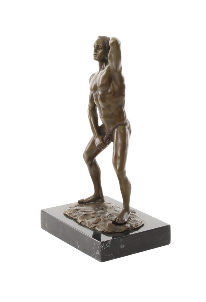 Bronze sculpture of a posing mascular male holding his phallus