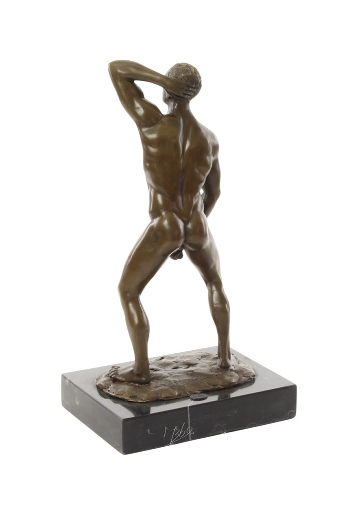 Bronze sculpture of a posing mascular male holding his phallus
