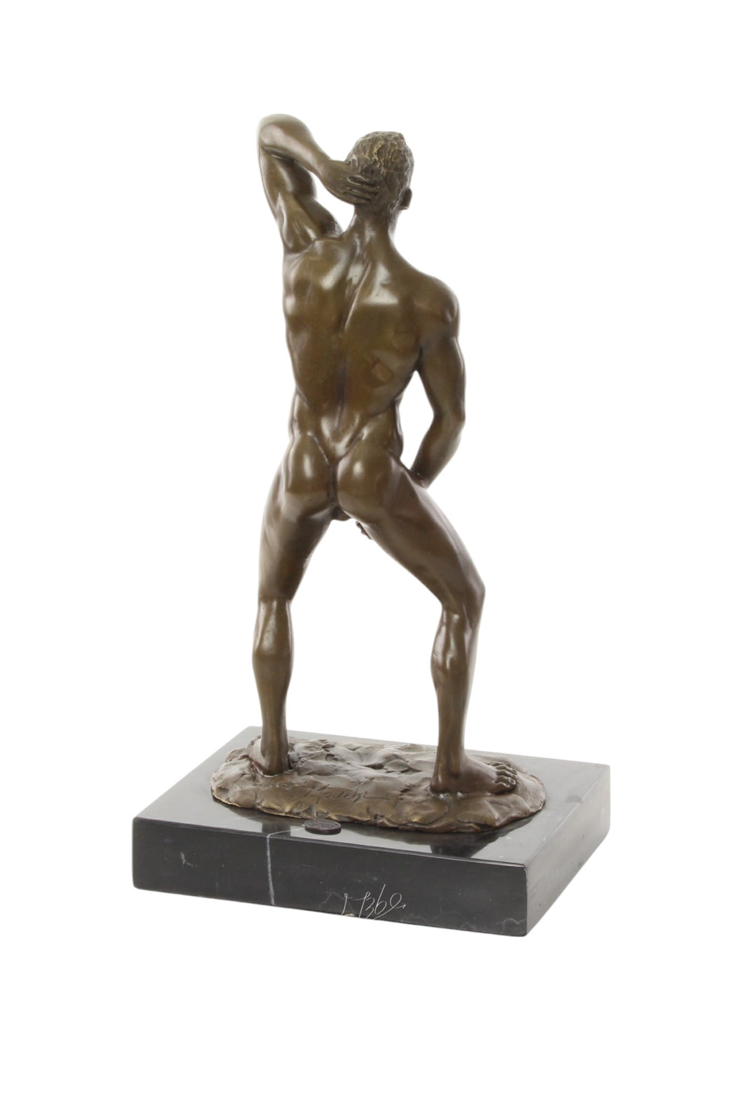 Bronze sculpture of a posing mascular male holding his phallus