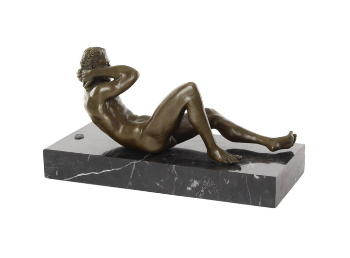 Bronze sculpture of a reclining male nude posing