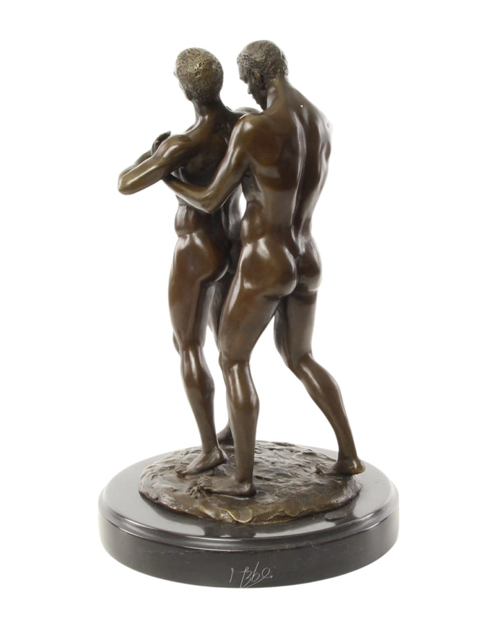 Bronze sculpture of an embracing nude male couple