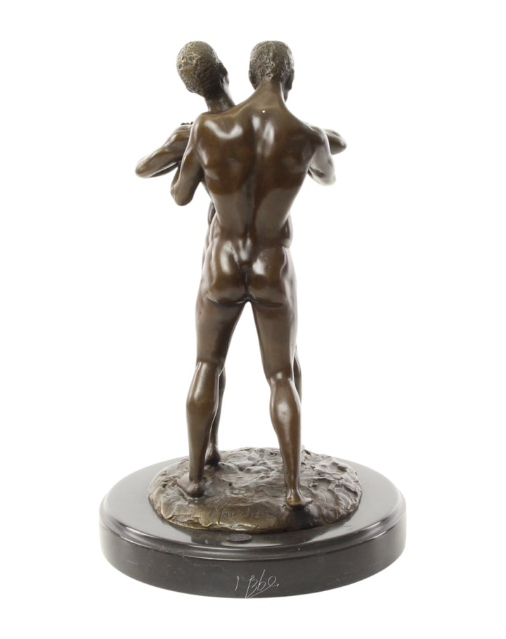 Bronze sculpture of an embracing nude male couple