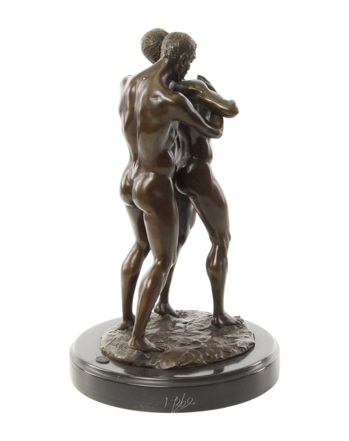 Bronze sculpture of an embracing nude male couple