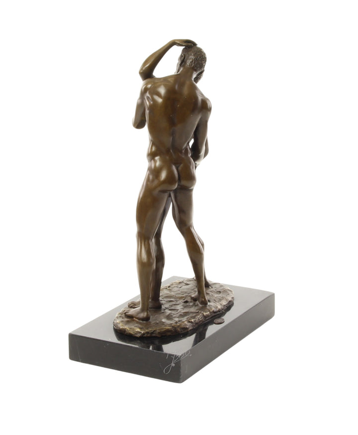 Bronze sculpture of a male couple being intimate