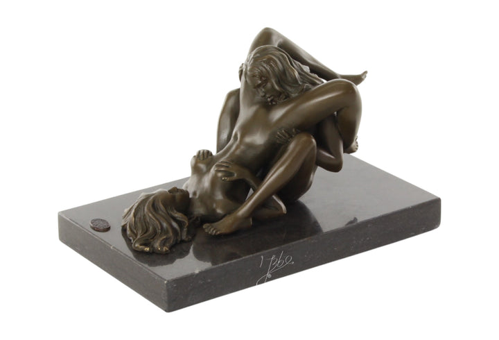 Bronze sculpture of a lesbian couple performing oral