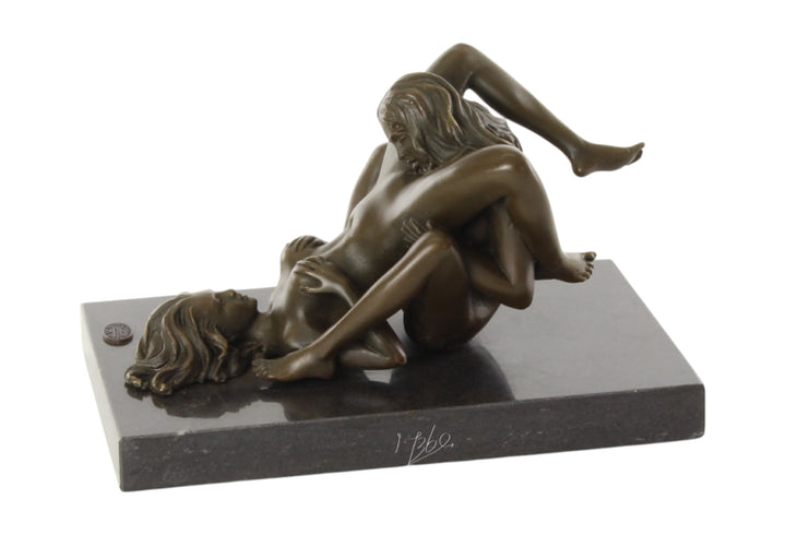 Bronze sculpture of a lesbian couple performing oral