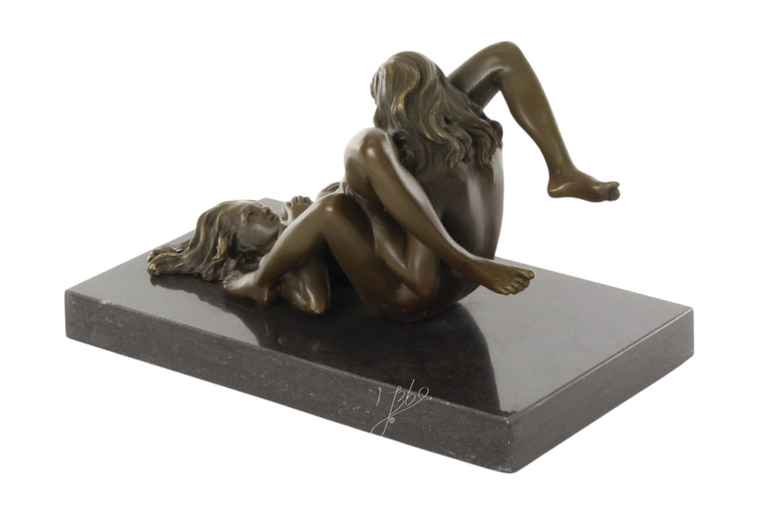 Bronze sculpture of a lesbian couple performing oral