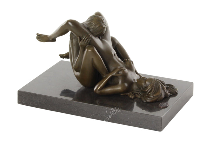 Bronze sculpture of a lesbian couple performing oral