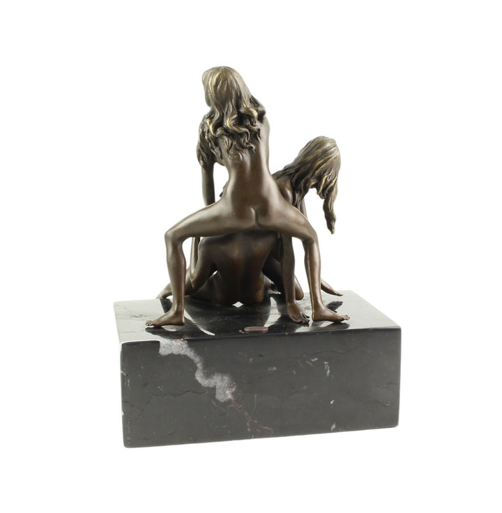 Bronze sculpture of a trio lovemaking scene